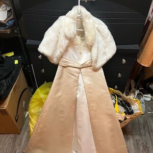 Kids David’s Bridal 5/6 white with small train and fur shall.
